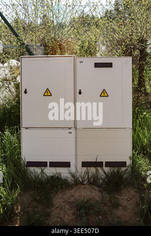 Industrial electrical distribution box mounted on a street pole ...