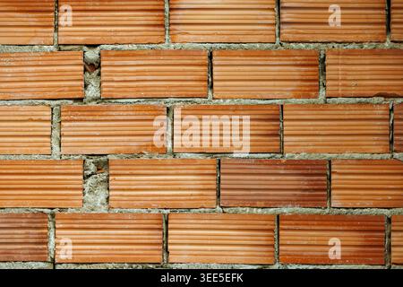 Newly Built Red Brick Wall Texture Background with Copy Space Stock Photo