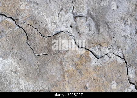 Grunge background texture of weathered concrete wall with fracture Stock Photo