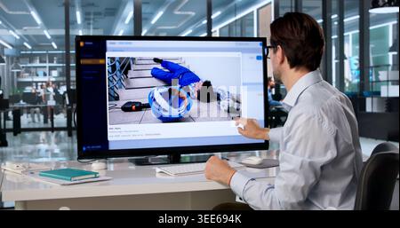 Police Officer Studies Criminal Case Files On Digital Touchscreen System. Stock Photo