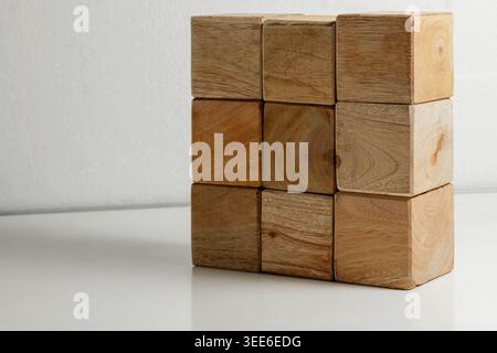 Nine Wooden Blocks Arranged in a Square. Wooden Blocks Background. Empty Background. Creativity Concept. . High quality photo Stock Photo