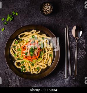 Traditional Korean chicken soup with homemade noodles (kalguksu). Stock Photo