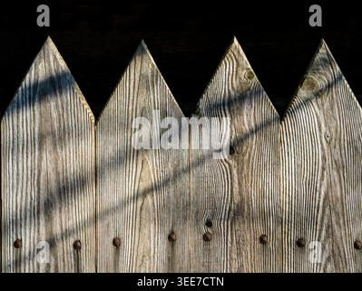 Old boards of a wooden fence Stock Photo