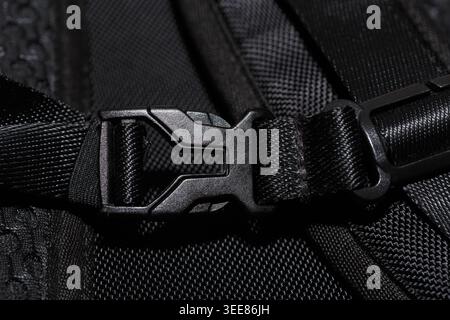 Macro texture shot of black buckle of a bag. Stock Photo
