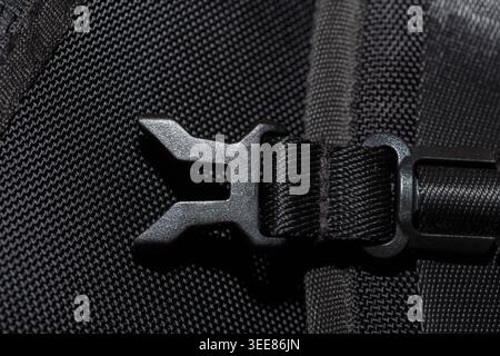 Macro texture shot of black buckle of a bag. Stock Photo