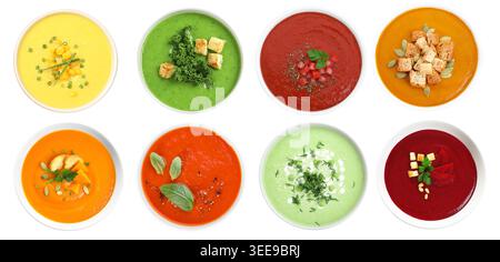 Different tasty soups in bowls isolated on white, collage. Top view Stock Photo