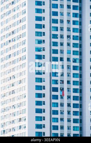 Tall apartment towers with repeating window Stock Photo