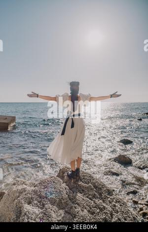 flowing white dress beach Photoshoot White Flowing Beach Dress Dreamy Beach Boho Wedding Inspiration Polka Dot Wedding
