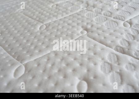 Soft surface of a new mattress in a home setting Stock Photo