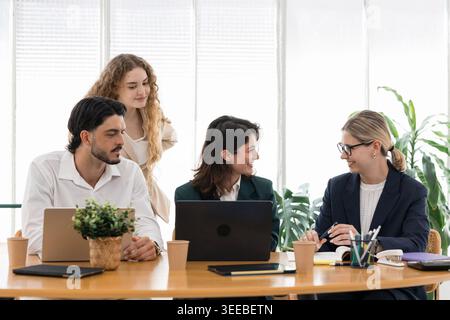 Diverse business team collaborating during office meeting Stock Photo