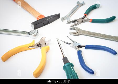 Set of different tools hammer, pliers, screwdriver, wrenches isolated on white background Stock Photo