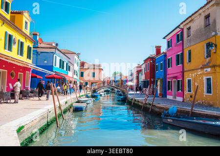 Burano Italy - 25 April 2026: Canal street with boats and colorful houses in Burano, Italy. Stock Photo
