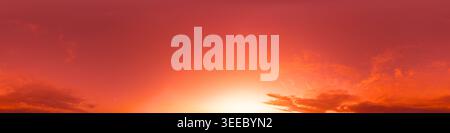 Sunset sky panorama shows vibrant orange and red colors with clouds at dawn for background and copy space Stock Photo
