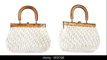 Vintage style crochet handbag with carved wooden handle isolated on white background. Handmade knitted purse in boho style, elegant retro fashion acce Stock Photo