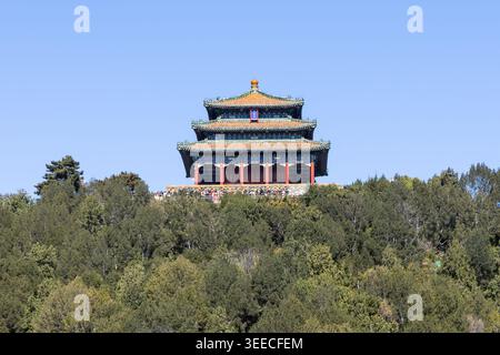 The Wanchun Pavilion located at the top of Jingshan Park in Beijing. Chinese words translated as Wanchun Pavilion in Chinese language. Stock Photo