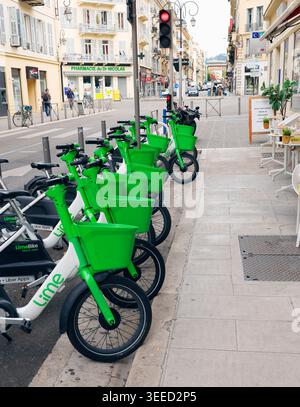Modern electric bike parked on a narrow forest trail blocked by a ...
