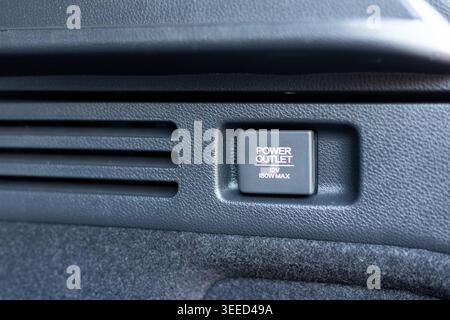 12V Socket Power Outlet in a Vehicle Closeup Stock Photo
