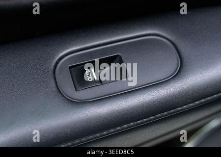 Closeup of a Window Control Button in Automatic Car Stock Photo