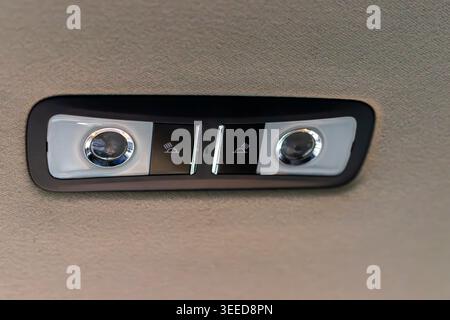 Close Up of Car Interior Reading Lights and Ceiling Controls Stock Photo