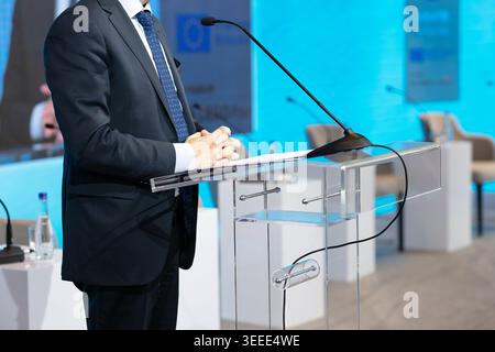 Public speaker at business conference, corporate coaching, workshop, training or political event. Public speaking concept. Stock Photo