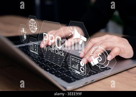 PPC pay per click advertising and campaign analytics concept. Person using laptop with virtual ads, megaphone, target audience, budget click online, Stock Photo