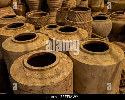Large handmade terracotta and ceramic pots for gardening Stock Photo