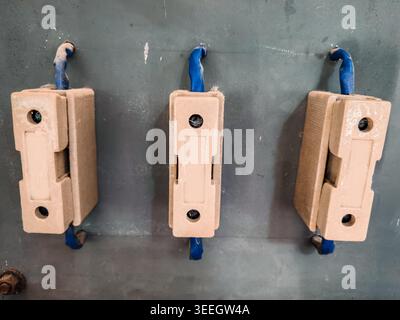 Vintage Ceramic Fuse Holders and Wiring on Industrial Control Board Stock Photo