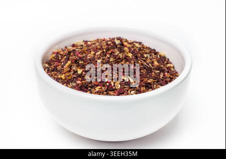 Red carcade aroma rose healthy tea with ceramic plate isolated on white background Stock Photo