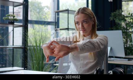 Caucasian business woman working with laptop resting tired feeling at table businesswoman relaxing stretching after typing computer work project Stock Photo