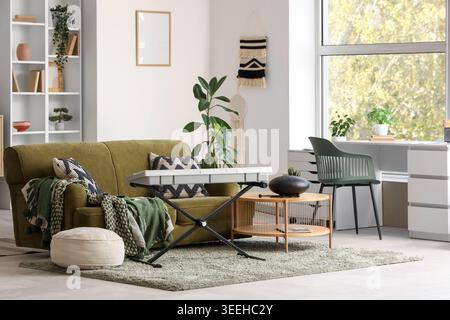 Interior of living room with sofa, glucophone and synthesizer Stock Photo
