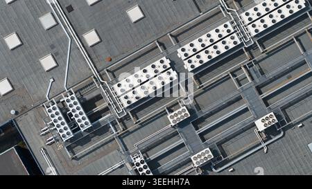 Large scale commercial data center with HVAC, cooling, ventilation, colocation, big data processing, and machine learning infrastructure. Stock Photo