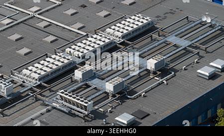 Large scale commercial data center with HVAC, cooling, ventilation, colocation, big data processing, and machine learning infrastructure. Stock Photo