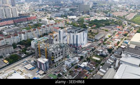 Aerial drone view of STT Bangkok 1 data center with cooling fans and HVAC systems, showing big data, cloud computing, AI infrastructure and modern dig Stock Photo