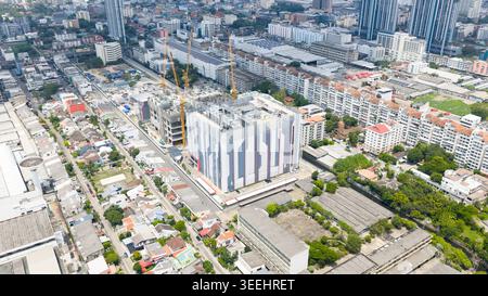 Aerial drone view of STT Bangkok 1 data center with cooling fans and HVAC systems, showing big data, cloud computing, AI infrastructure and modern dig Stock Photo