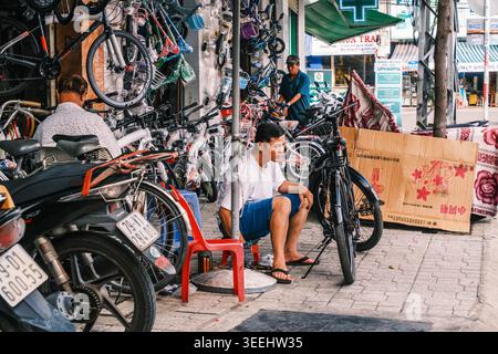 Bicycle Retail and Maintenance Sidewalk Shop Stock Photo