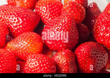 Full-frame close-up of cleaned and ready-to-eat strawberries (lat: Fragaria). Stock Photo