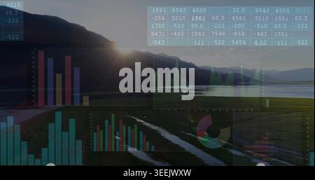 Displaying HUD data overlays floating over marsh channels at lakeside low sun, with bar charts Stock Photo