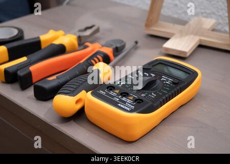 Electrical tools and multimeter for measuring voltage and current Stock Photo