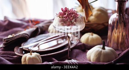 Autumn table setting with white pumpkins and rustic decor Stock Photo