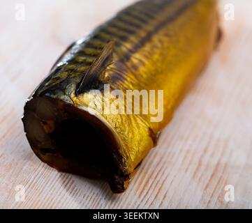 Smoked mackerel on wooden background Stock Photo