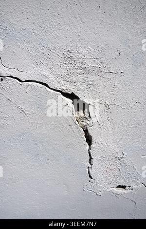 Cracked wall surface in a building Stock Photo