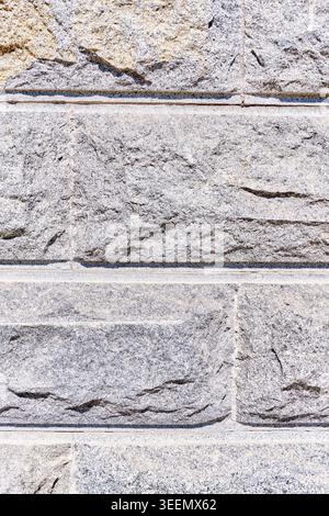 Close up macro texture of rough asphalt with gravel and stone inlays. High quality photo Stock Photo