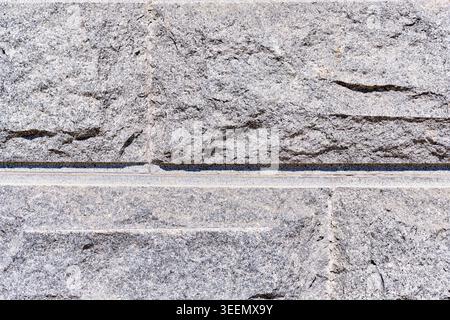 Close up macro texture of rough asphalt with gravel and stone inlays. High quality photo Stock Photo