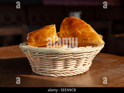 Asian Bread Pieces on Restaurant Table, Bread Pieces Served in a Basket, Breakfast Table Stock Photo