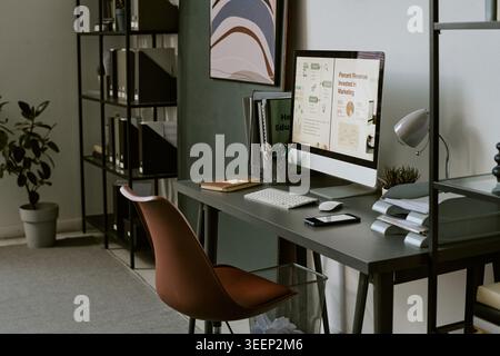 Modern Office Workspace Displaying Marketing Analytics Dashboard Stock Photo