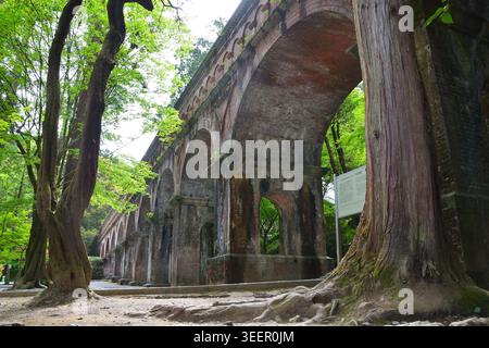 Low angle view of brick arches at Suirokaku Aqueduct in Kyoto, Japan Stock Photo