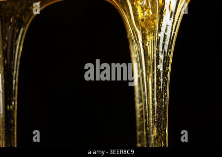 Flowing golden honey with air bubbles texture. Stock Photo