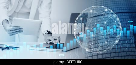 Cropped image of busy girl using tablet and computer Stock Photo