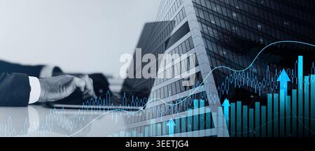 Close-up of a businessman's hands typing on a laptop keyboard Stock Photo