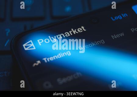 Polymarket website logo and interface displayed on a smartphone screen, decentralized prediction market platform for cryptocurrency betting and Stock Photo